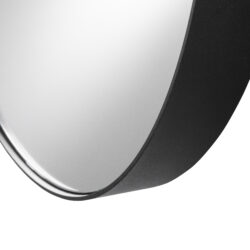 Detaljbild svart rund spegel med metallram