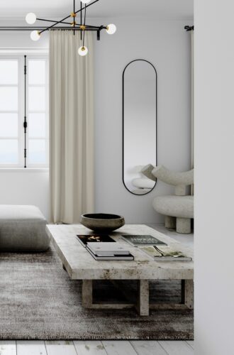 Tall and oval mirror arranged in livingroom